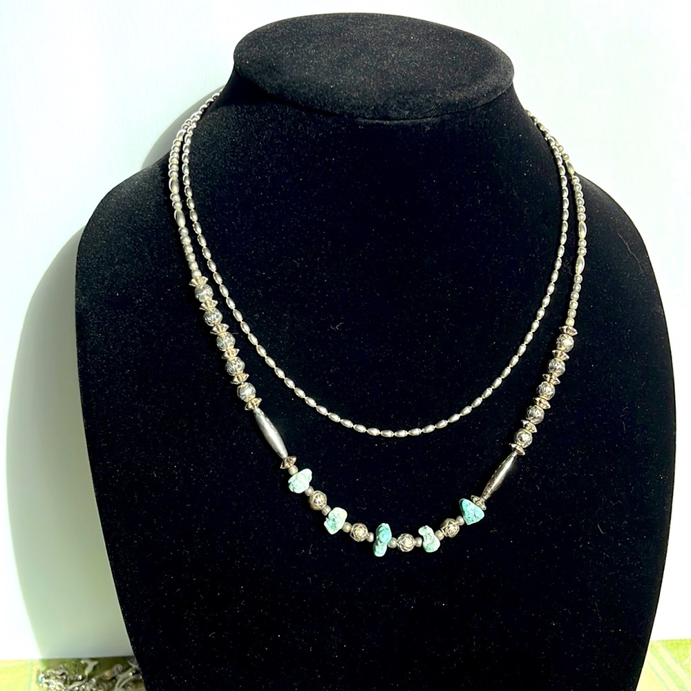Two silver necklaces